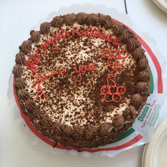 Cake that says Congratulations Radhika